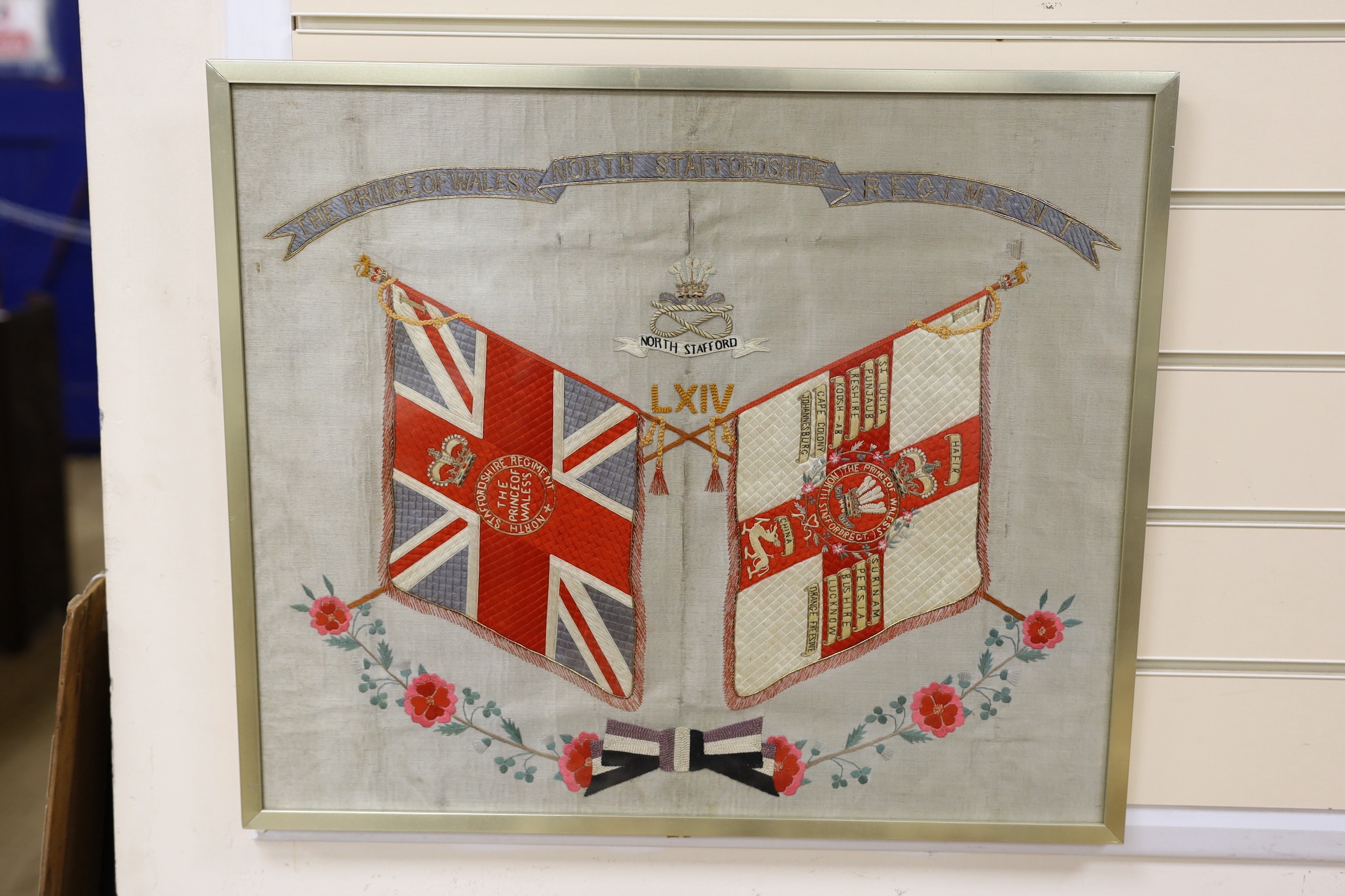 Two Regimental embroidered silk pictures, Kings and Regimental colours